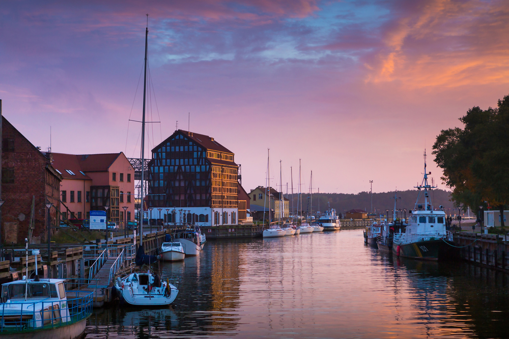 teaching in lithuania includes waterfront views of historic buildings and architecture